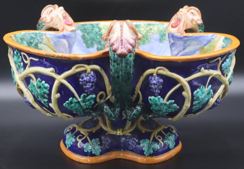 Italian Classical Majolica Pottery Center Bowl.: Italian Classical Majolica pottery center bowl with lobed border accented by (3) Northwind masks displaying extended tongues. Interior of bowl depicts a lounging beauty admiring herself in a mirror he