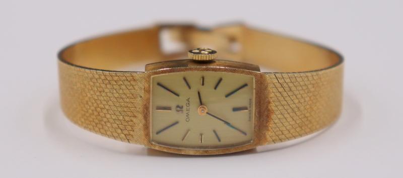 JEWELRY. Lady's Omega 14kt Gold Bracelet Watch. (1 of 14)