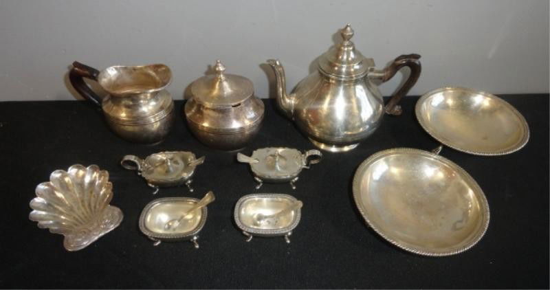 SILVER. Lot of Assorted 800 Silver Items.: Approx 39 troy oz. 3 piece tea set, tea pot - 6.25" high, 2 plates, condiments & a shell. From a Rio, Brazil estate.please note weight change
