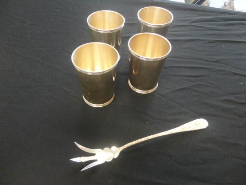 STERLING. Lot of Assorted Items.: Includes four beakers, Steiff and a Steiff serving utensil. Approx 19.8 troy oz. From an 1100 Park Ave NYC estate. Dimensions: Fork - 9" in length.