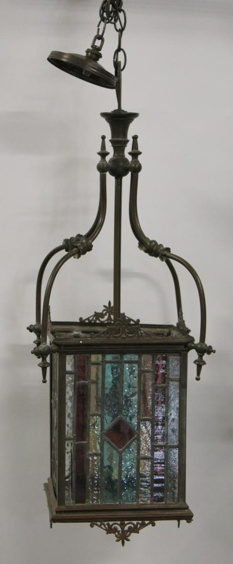 Antique Patinated Metal & Glass Moorish Style: Lantern. From a Bellmore, Long Island, NY estate. - Dimensions: 32" x 12" x 12"
