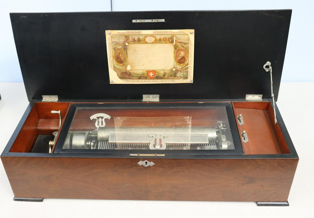 Henry Gautschi & Sons 12 Tune Swiss Cylinder: Music Box. Housed in all original mahogany case. From a Bridgehampton Long island, NY estate. - Dimensions: 8" x 11" x 30"