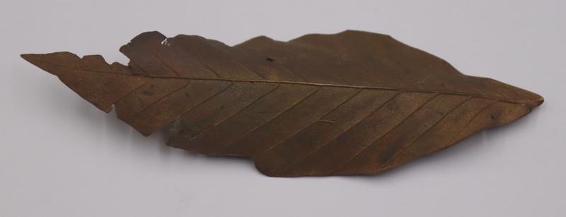 John Iversen Patinated Metal Leaf Brooch.: Signed John Iversen patinated metal leaf brooch. From lost wax casting. Signed, "Iversen" verso. From a Stamford, CT estate. Dimensions: leaf brooch measures approx. 5" x 1.675".