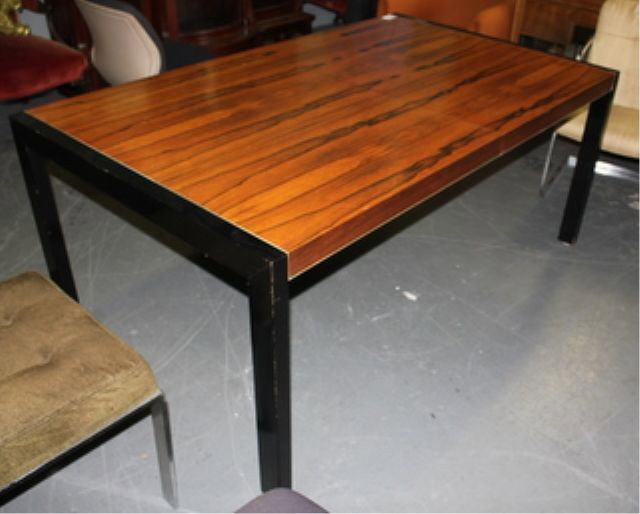 Probber, Harvey. Rosewood Dining Table with: Ebonized Ends. Two 20" leaves. From a Larchmont, NY home. Dimensions: 40" wide x 28.5" high plus 2-20" leaves.