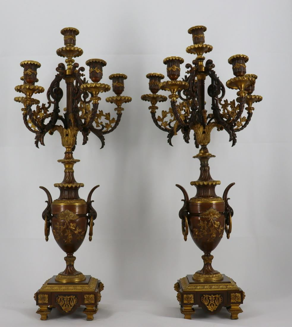 A Fine Pair of Gilt & Patinated Bronze Candelabra: Great patina. Large and with fine bronze work. From a Long Island, NY estate. - Dimensions: 28" h x 13" w.