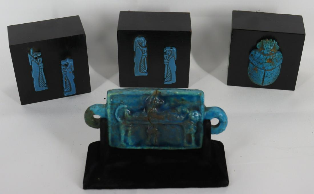 Egyptian Antique Blue Faience Grouping (4 Pcs): 4 different mounted Egyptian faience pottery groupings. 1) a 2" tall blue depiction of a god, together with a falcon headed depiction of another god (Horus?), 2) A jackal headed god (Anubis?), to