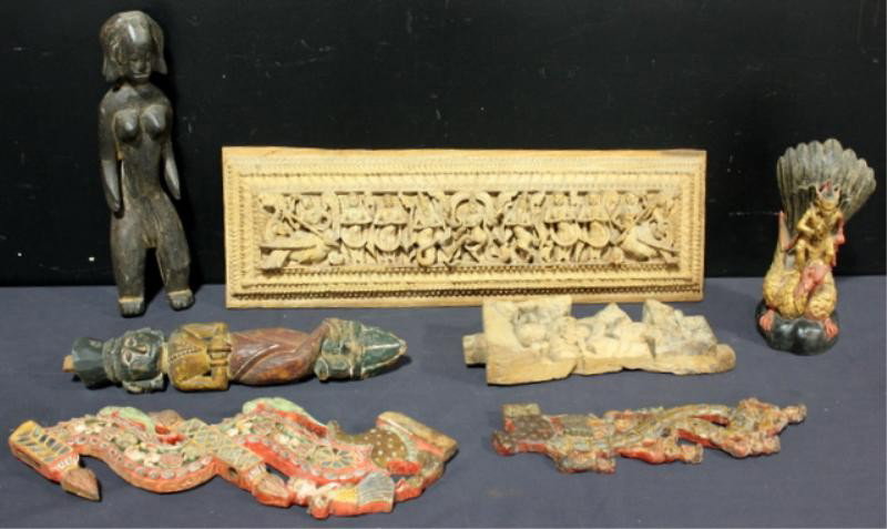 Lot of Antique Wood Carvings.: Incldues an African fetish figure, an painted Indian figure, an Indian fragment, a gilded painted Siamese figure on a bird, a deeply carved Indian panel, and two polychrome and mirrored architectural 