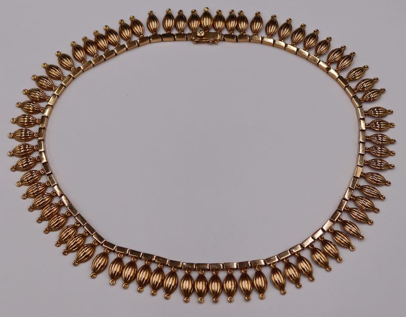 JEWELRY. Continental 18kt Gold Choker Necklace.: Continental 18kt yellow gold choker length necklace displaying ribbed oblong pendants. With an unidentified pictorial hallmark. Total approx. weight is 25.3 dwt (gross). From a Greenwich, CT estate. D