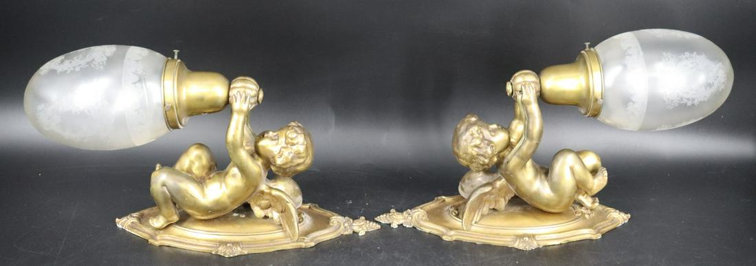 An Antique Pr Of Bronze Cherub Form Sconces. (1 of 6)