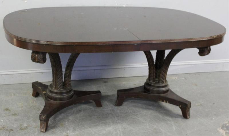Neoclassical Style Mahogany Dining Table with: Prince of Wales Plume-Form Pedestal Base and Leaves. From a Yonkers, NY estate. Dimensions: 45" w x 67" d x 30.5" h. 14.5" leaves.