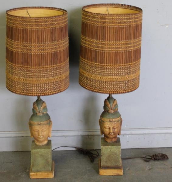 Pair of James Mont Style Midcentury Lamps.: Painted plaster as bust of Quan Yin. With original wood and cloth shades. From a Larchmont, NY estate. Condition: Interior lining of shade - as is. Dimensions: 18" high.