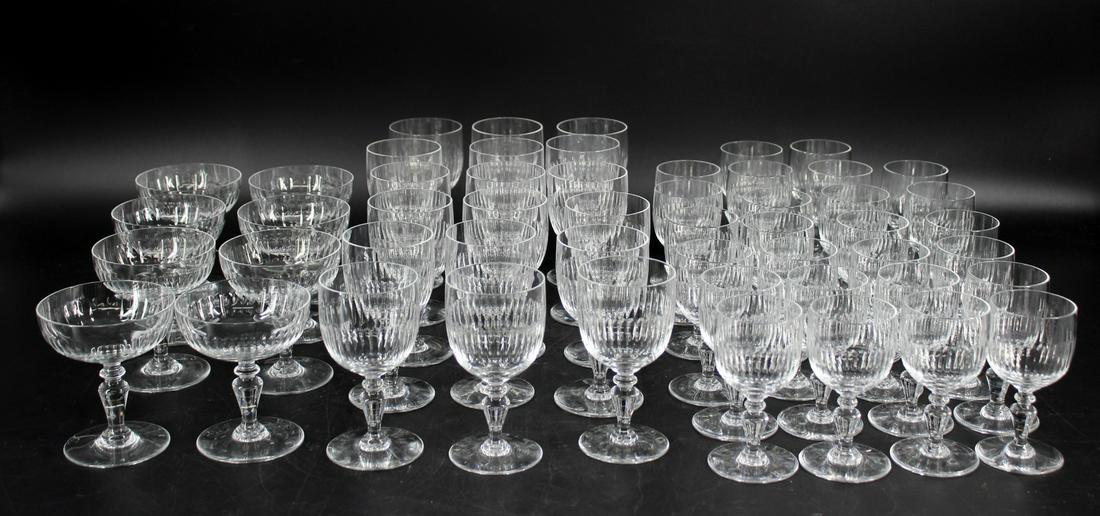 Large Lot of Baccarat Stemware.: Large grouping of Baccarat stemware to include: 18 Wine goblets (5 1/8" h x 2.75" w), 26 sherry glasses (4.5" h x 2.25" w), and 8 coupe glasses (4.25" h x 3.75" dia). Sta