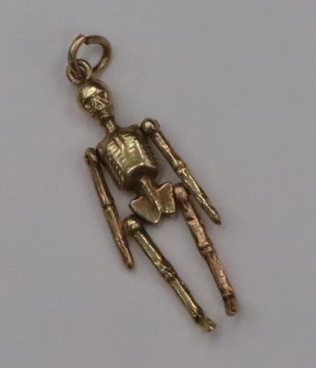 JEWELRY. 14kt Gold Articulated Skeleton Charm. (1 of 6)