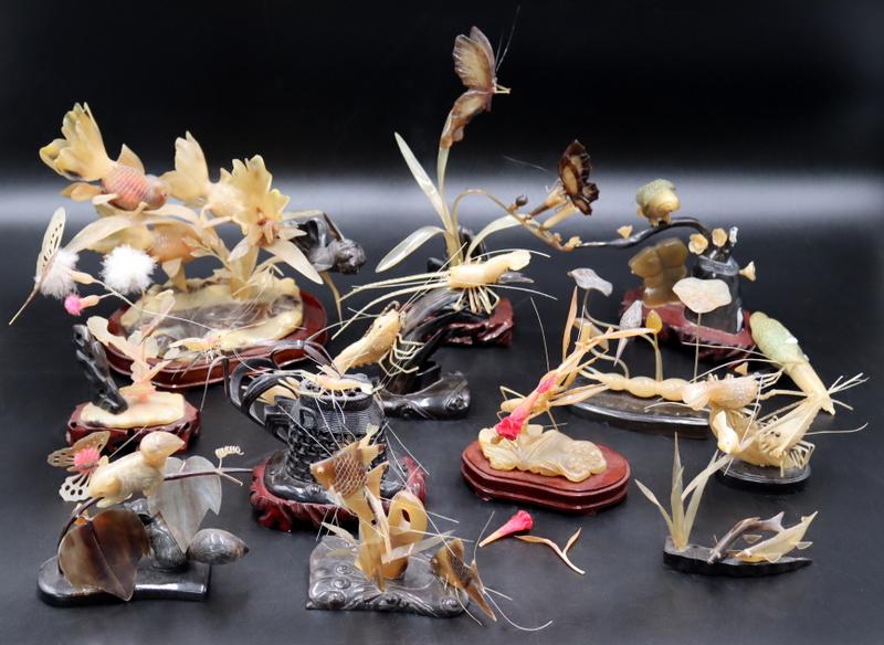 Collection of (11) Chinese Buffalo Horn Carved: Figural Groupings. Including birds, koi fish, birds, shrimp, squirrels, etc. From a Long Island, NY estate. Dimensions: 9" w x 8" d x 8.5" h.