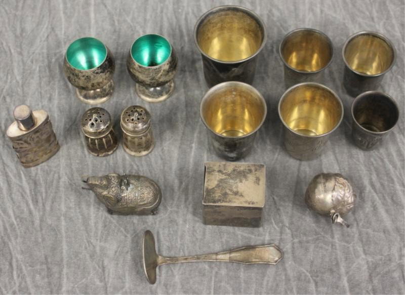 STERLING. Miscellaneous Lot Including Tiffany.: A set of 6 graduated engraved cups, marked 84 and with a makers mark of C.T. - Tallest cup measures 2.5" high. A Tiffany & Co. Sterling Stamp box - 1.5" x 1.5" x 1.25"; 2 Gorham cordials; 2 sterling s