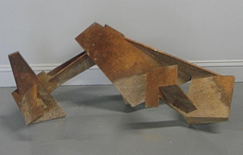 WITKIN, Isaac. 1975 Abstract Iron Sculpture.: Isaac Witkin, South African, 1936-2006. Signed and dated. From a Scarsdale, NY collector. Dimensions: 42" wide x 17" deep x 20" high. Condition: Weathered iron oxide/rusted patina.