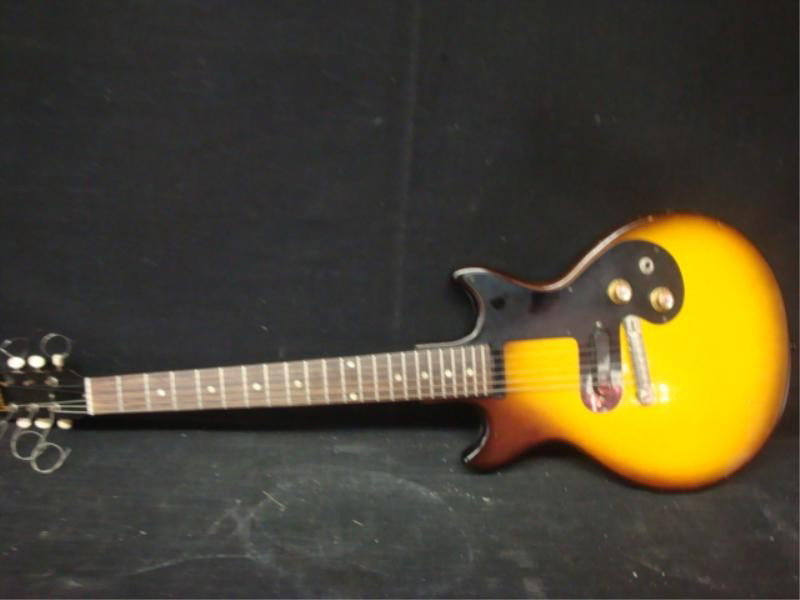 GIBSON. 60's Vintage Electric Guitar Serial 22811.: From an East 79th St NYC estate. Approx 38" long in hardboard case. Serial appears to date it to 1961.