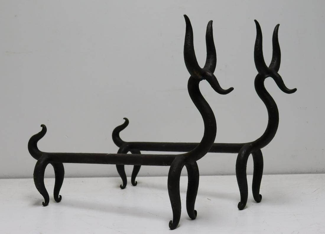 A Pair Of Wrought Iron Dog Form Andirons. (1 of 5)