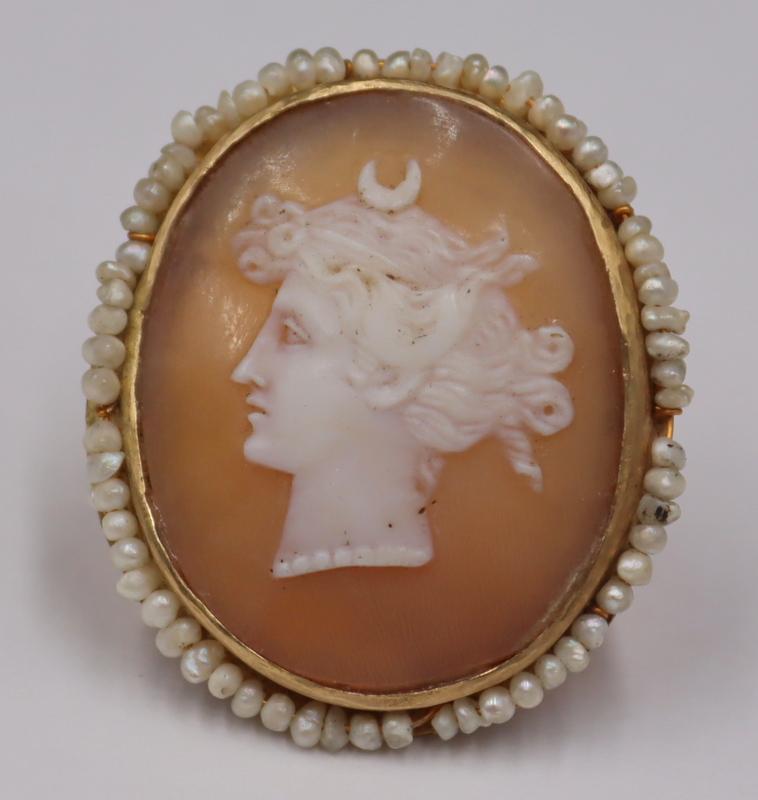 JEWELRY. Antique Carved Cameo and 18kt Gold Ring.: 18kt yellow gold ring displaying a central carved cameo of Diana with a crescent moon in her hair, and further accented by a surround of seed pearls. Total approx. weight of the ring is 5.6 dwt (gross