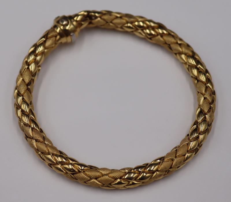 JEWELRY. Chimento Italian 18kt Gold Bracelet.: Signed Chimento Italian 18kt yellow gold articulated bracelet displaying polished and textured diamond form pendants. With a single round brilliant cut diamond accent to the closure. Signed, "Chi