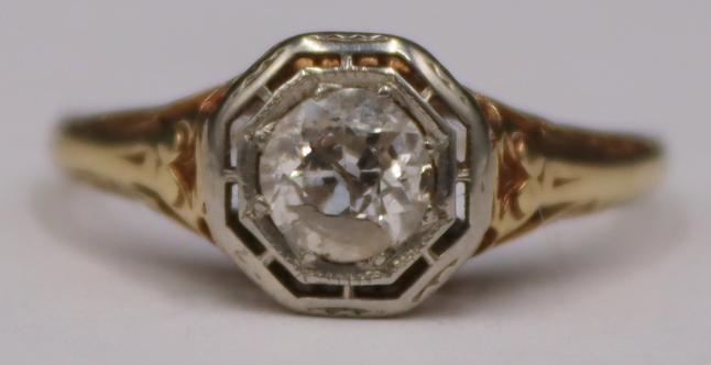 JEWELRY. 14kt Bi-Color Old European Cut Diamond: Ring. Art Deco 14kt yellow gold band displaying a central 14kt white gold mounted Old European cut diamond. Diamond measures approx. 4.5mm. Diamond displays an approx. color of J/K, and an approx. cla