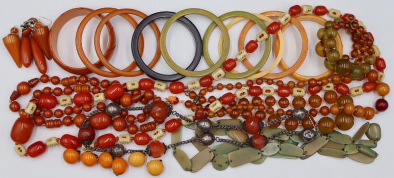 JEWELRY. Collection of Bakelite Jewelry.: Includes (7) Bakelite slicer bracelets; (1) mustard faceted Bakelite bracelet; (1) burnt orange carved Bakelite bracelet; matching Bakelite apple juice beaded bracelet and necklace - with repair; (1)