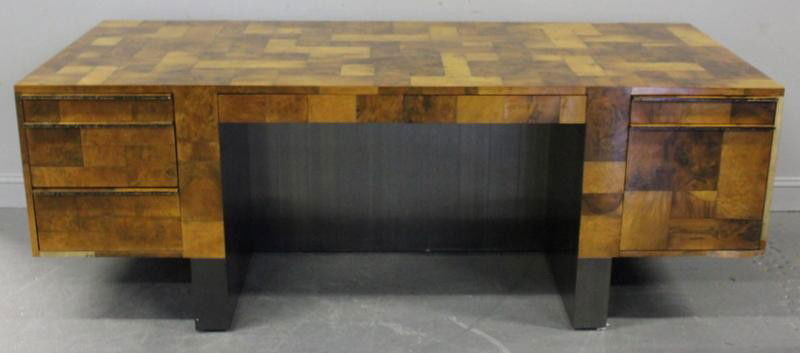 Paul Evans Cityscape Twin Pedestal Desk.: Burl walnut with 7 drawers and mirrored chrome. From a New Rochelle home. Dimensions: 29.5" x 84" x 36." Condition: Generally good but some veneer losses