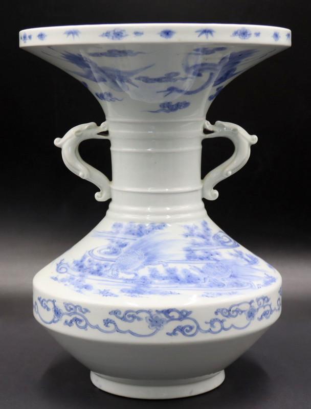 Large Japanese Hirado Blue and White Trumpet Vase.: Large Japanese Hirado blue and white vase displaying Minogame turtles to the body of the vessel, and flying cranes beneath the oversized rim. Shishi form handles. From a Mt Sinai, NY estate. Dimension