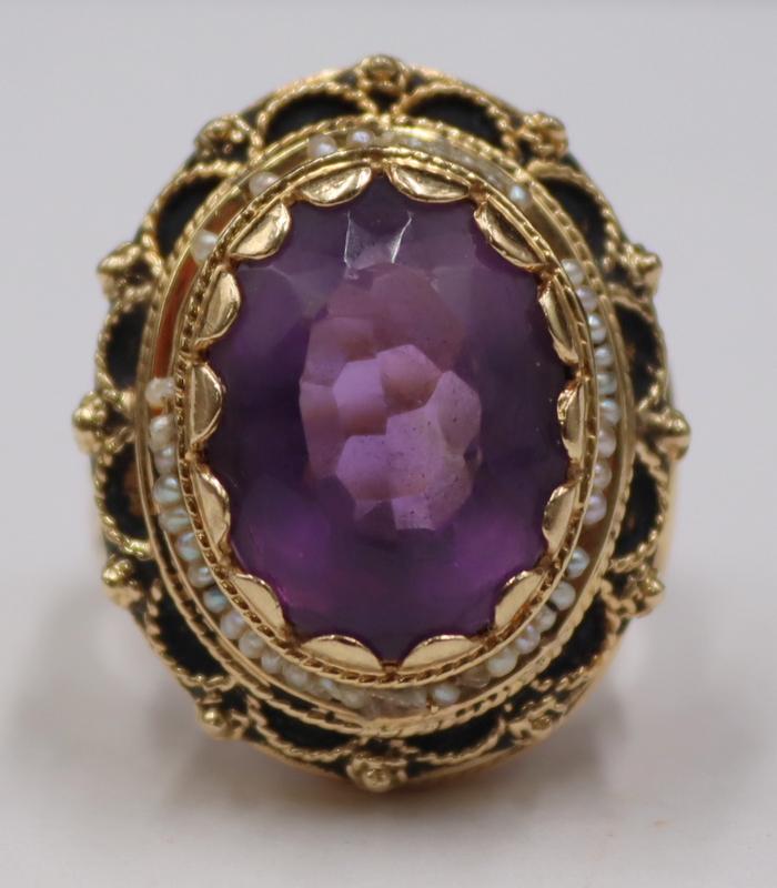 JEWELRY. 14kt Gold, Amethyst, and Seed Pearl: Cocktail Ring. Vintage 14kt yellow gold cocktail ring displaying a central oval faceted amethyst with a surround of seed pearls. Stamped, "14K". Total approx. weight of the ring is 9.5 dwt (