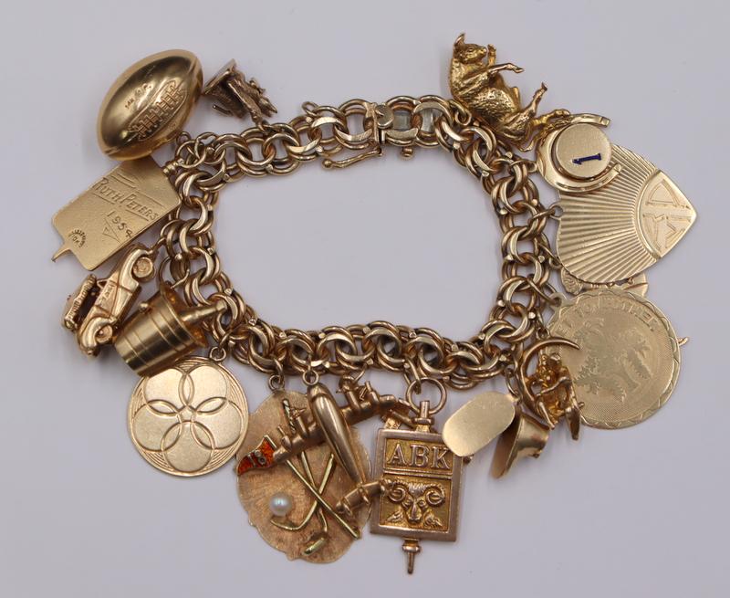 JEWELRY. 14kt Gold Charm Bracelet with Assorted (1 of 13)