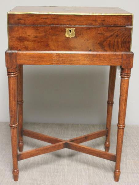 Walnut Lap Desk on Stand with Brass Trim and: Escutcheon Design. From an attorney's 230 Park Avenue NYC estate. Dimensions: 16.5" wide x 10" deep x 25" high.