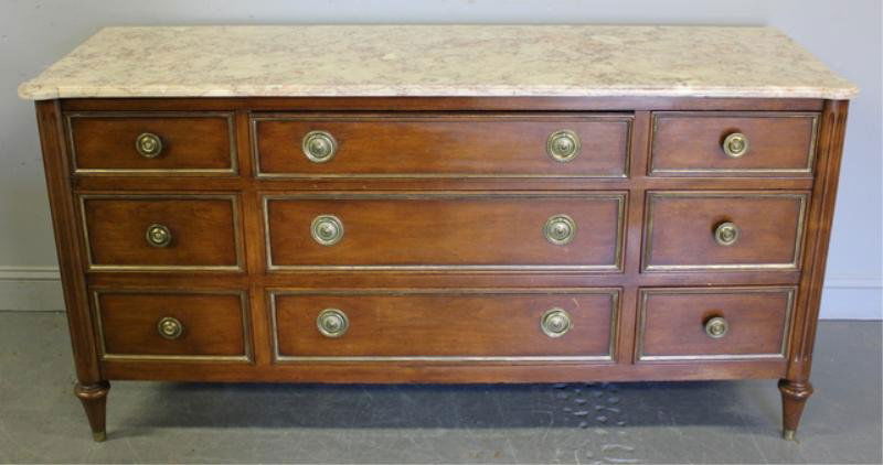 Louis XV Style Marble Top Credenza.: Stamped Bodart. Brass trim around drawer fronts. From a prominent East Hampton, NY estate. Dimensions: 65" wide x 21.75" deep x 33" high.