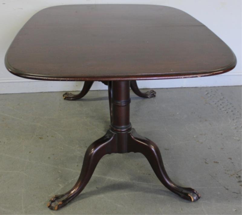 Mahogany Dining Table Raised On Ball & Claw Feet.: Twin pedestal with leaves. From a Yonkers, NY estate.