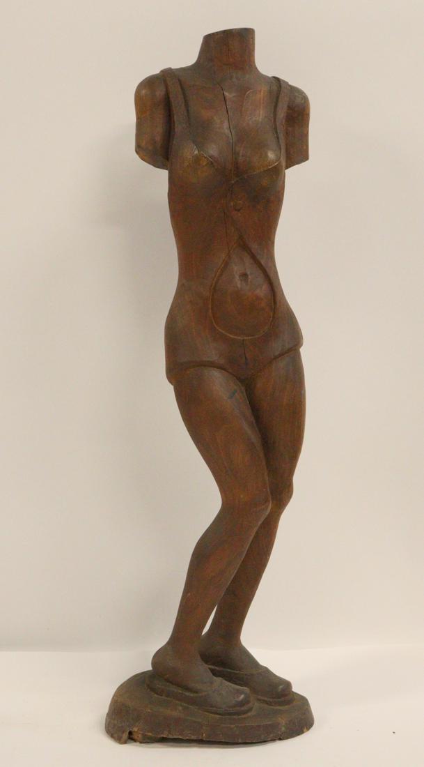 HAITIAN WOOD SCULPTURE OF BODICE IN BATHING SUIT.: Signed. From a New Rochelle, NY estate. - Dimensions: 47" h.