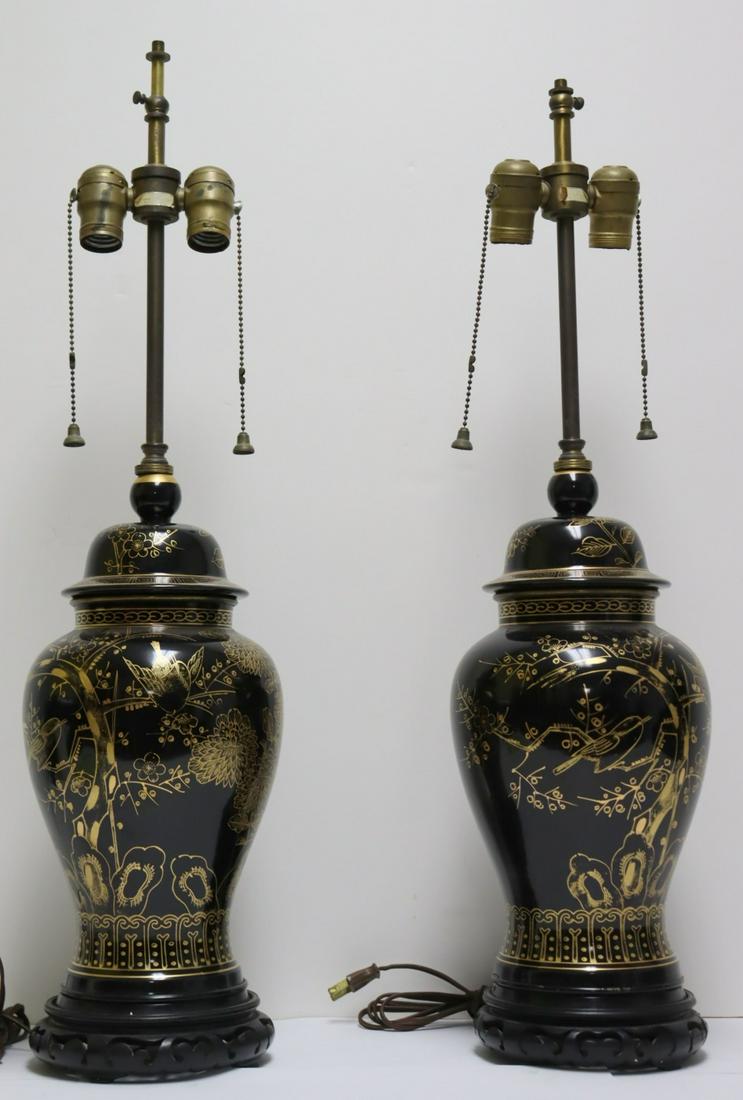 An Antique Pr Of gilt Decorated Black Porcelain.: Lamps. From a New Jersey estate. - Dimensions: Urns: 15" h, to finials 28" h.