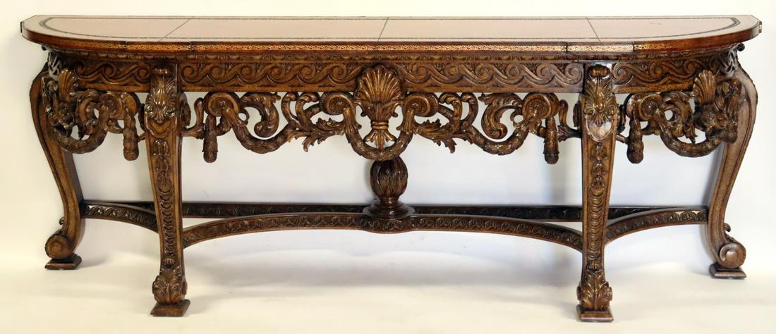 Vintage Highly Carved Leathertop Console.: Good large size, carved all over and with tooled leathertop. From an Englewood, NJ estate. - Dimensions: 33" h 90" w x 21" d.