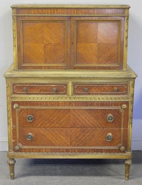 Painted and Gilded Satinwood Gentlemen's Chest.: From a New Rochelle, NY estate. Dimensions: 40" wide x 22.25" deep x 54" high. Condition: Veneer losses and general wear to finish.
