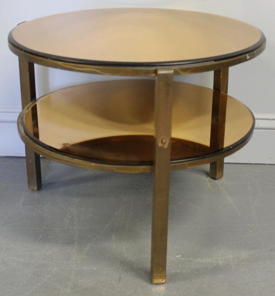 Midcentury Brass Occasional Table.: With original beveled mirror. From a 1170 Park Avenue NYC estate. Dimensions: 20" diameter x 16.25" high. Condition: Scratches and one chip to glass.
