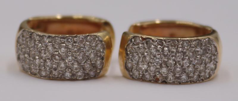 JEWELRY. 14kt Gold and Pave Diamond Huggie: Hoop Earrings. Stamped, "14K". Total approx. weight of the earrings is 5.1 dwt (gross). From a Manhattan, NY estate. Dimensions: earrings measure approx. 0.30" w x 0.70" h.