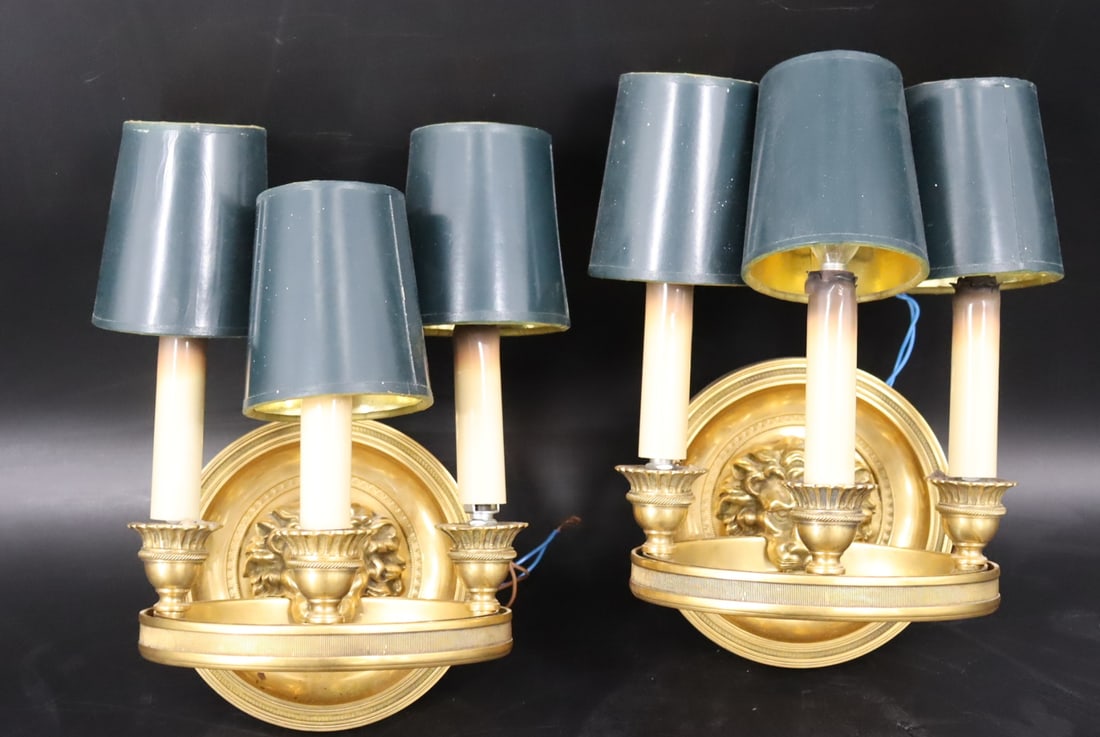 A  Pair Of Gilt Metal Lion Head Sconces. (1 of 5)