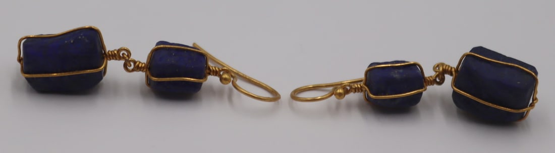 JEWELRY. Pair of Gurhan High Karat Gold and Lapis: Lazulis Drop Earrings. Includes a pair of signed Gurhan 0.990 high karat gold drop form earrings displaying (2) rough cut Lapis Lazulis pendants. With an applied plaque inscribed, "0.990 Gurhan E