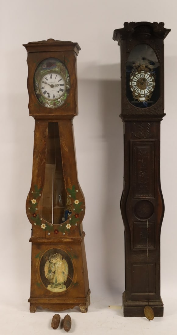 2 Antique French Grandfather Clocks.: 2 great looking clocks. 1 finely carved and the other with enamel decorated pendulum and face. From a Westchester County, NY estate. - Dimensions: 88" h & 97" h.