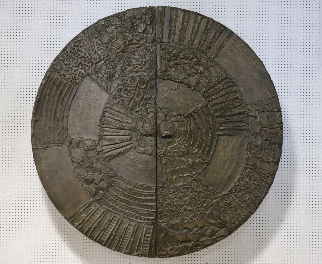 PAUL EVANS; DIRECTIONAL Sculptured Metal Disc Bar: DIRECTIONAL Sculptured Metal disc bar, USA, 1970sBronze, composite,ebonized interior. Signed and dated, PE. Originally purchased at Doyle in 2005. From a Stamford, CT estate. - Dimensions: 72" dia.