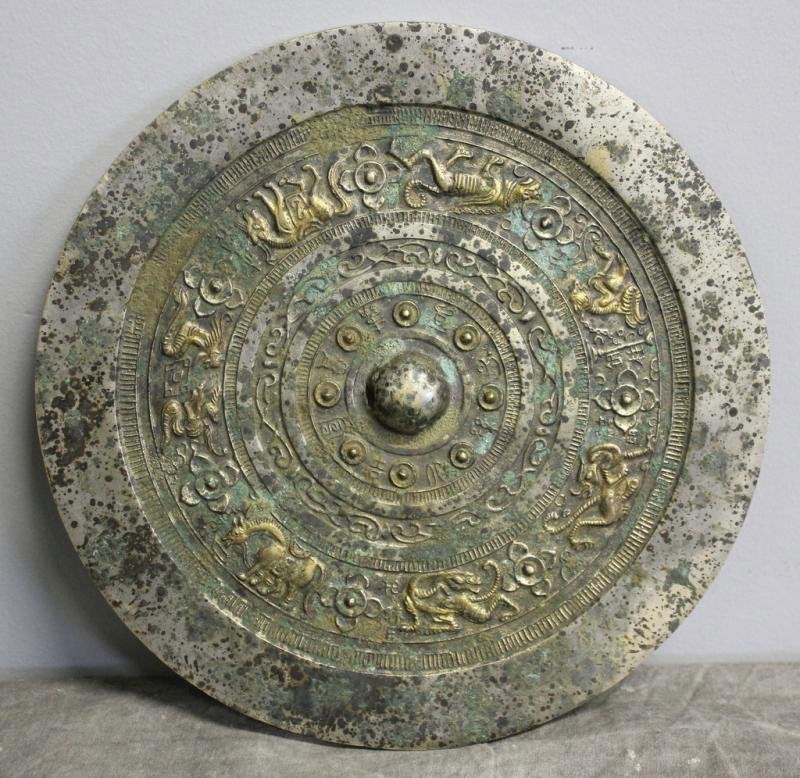 Chinese Hand Mirror with Gilded Animals.: From a Rye, NY estate. Dimensions: 8.6875" diameter.