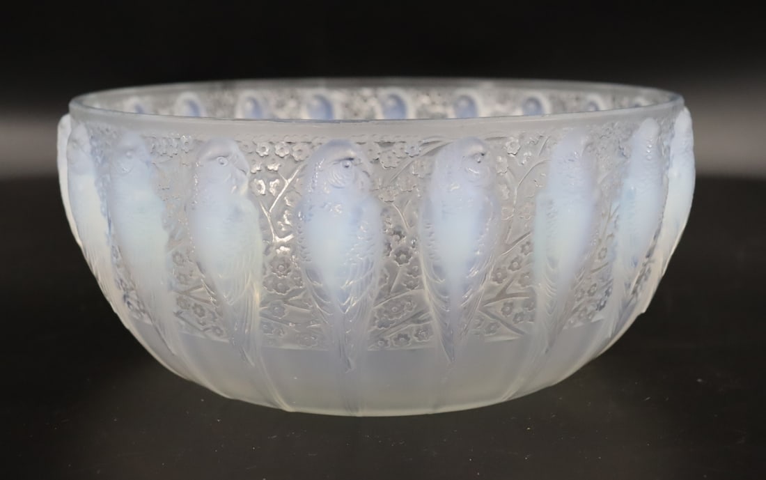 RENE LALIQUE (France, 1860-1945).: LALIQUE PERRUCHES OPALESCENT ART GLASS BOWL, colorless with opalescent parrots, band of repeated pressed parrots in front of a foliate background, signed "R. LALIQUE FRANCE". Circa 1931 rim. From a Ne