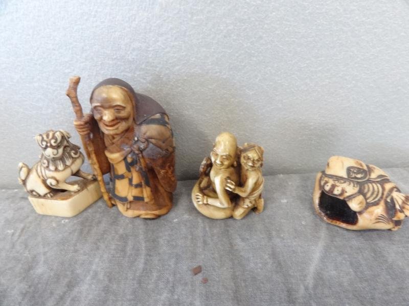 4 Small Asian Ivories.: Old man holding a cane and beads - 2.75" high, dyed; and 3 Netsuke style Ivories - 1.75" high. From an East 77th St NYC estate. Condition: Good.