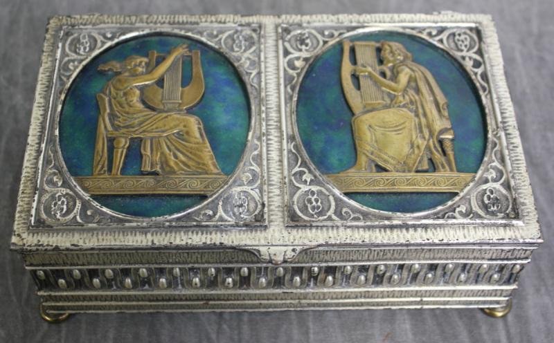 Oscar Bach Silver Gilt Box.: With figural decorations on turquoise enamel. Signed. From a NYC estate. Dimensions: 8.25" wide x 5.25" deep x 2.75" high.