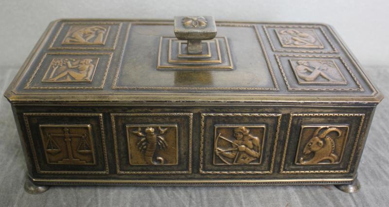 Possibly Oscar Bach Box with Zodiac and 4 Elements: Design. With claw feet. From a NYC estate. Dimensions: 10.75" wide x 5.75" deep x 5" high.