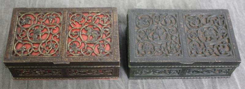 2 Oscar Bach Patinated Boxes.: One with lion motif and one with griffin motif. From a NYC estate. Dimensions: 5.5" wide x 3.25" deep x 2" high.