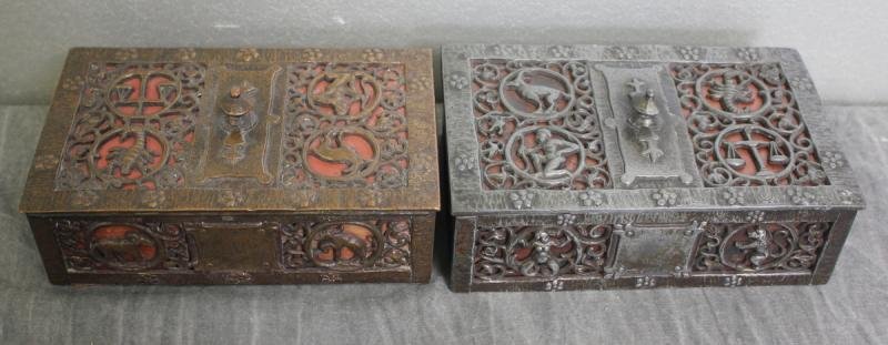 2 Patinated Boxes with Zodiac Reliefs.: Silver box signed Oscar B. Bach on front left edge of lid. From a NYC estate. Dimensions: 7" wide x 4.25" deep x 3.5" high.